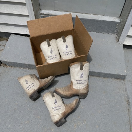 Branded cowboy boots with logo
